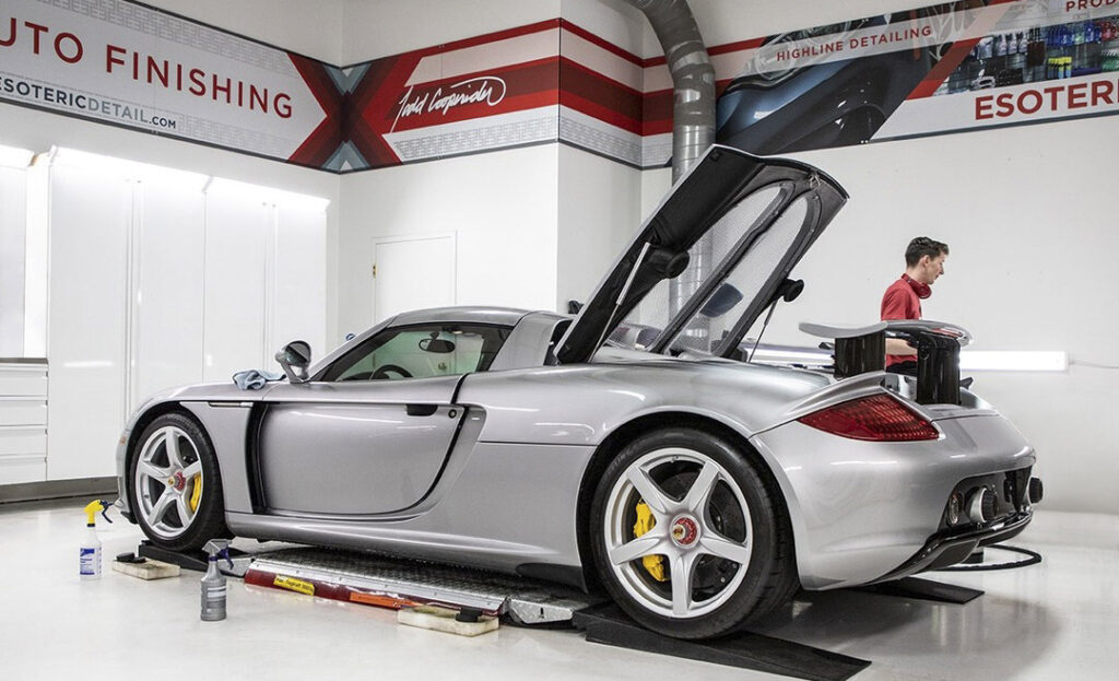 Image of ESOTERIC detailing a Porsche 918 Spyder in their luxury car detail shop furnished with VAULT's high-quality metal cabinets